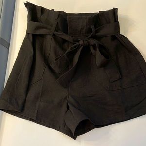 Medium Black ruffle waisted shorts condition no fading